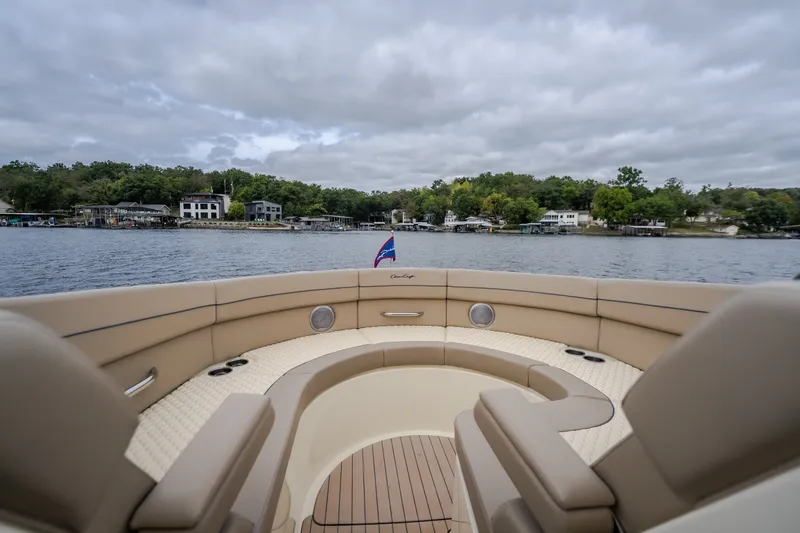 Slide: The Image of Luxurious 2027 Chris-Craft Launch 35 GT boat interior with scenic lake view. - 70