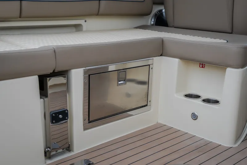 Slide: The Image of 2027 Chris-Craft Launch 35 GT interior with cushioned seating and built-in storage. - 47