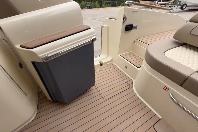 Slide: The Image of 2027 Chris-Craft Launch 35 GT boat interior with elegant seating and teak flooring. - 25