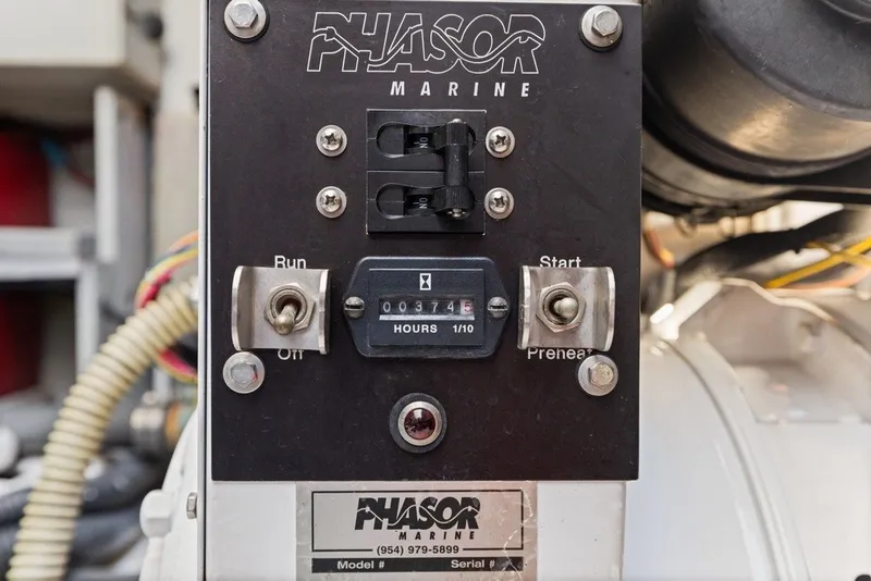 Slide: The Image of Phasor Marine control panel on 2005 Uniesse 54 Sport yacht engine. - 31