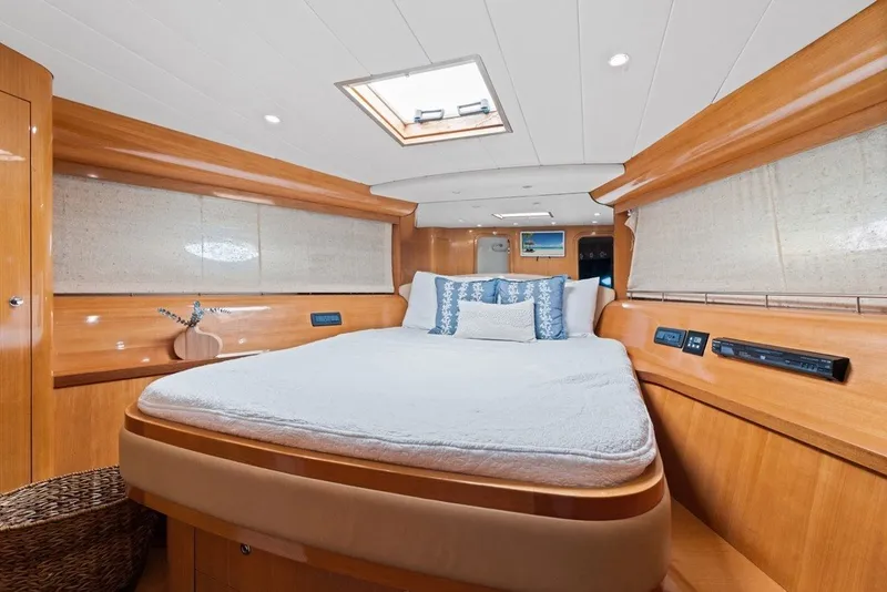 Slide: The Image of Luxurious cabin interior of 2005 Uniesse 54 Sport yacht with cozy bedding. - 14