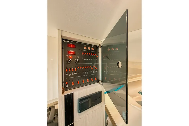 Slide: The Image of Control panel of 2024 FIM 34 Regina yacht with open glass door. - 28