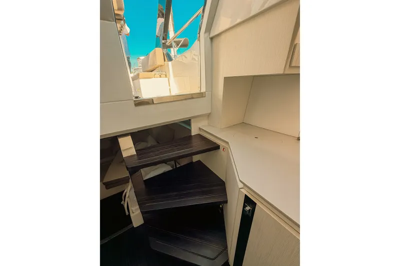 Slide: The Image of Interior stairs of 2024 FIM 34 Regina yacht, leading to upper deck. - 19