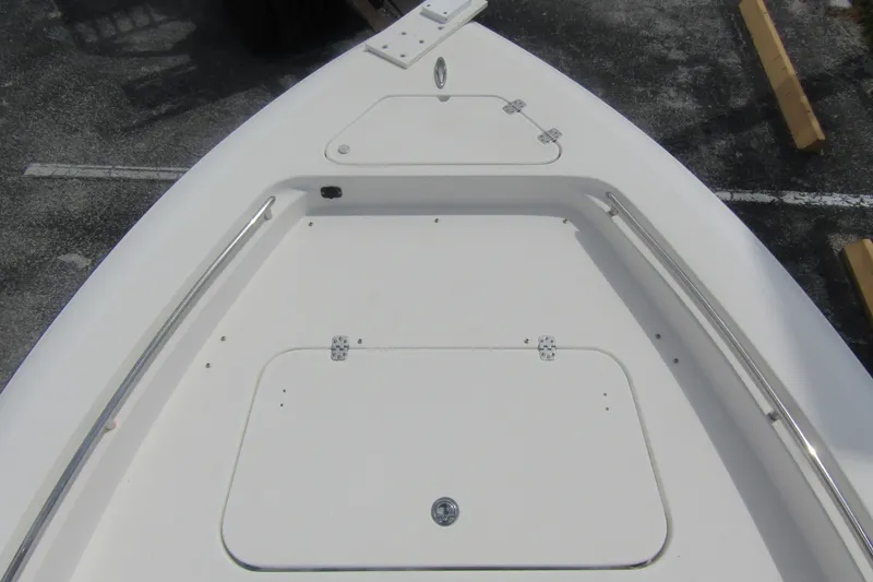 Slide: The Image of 2018 ShearWater 260 Carolina Flare boat deck with storage compartments and stainless steel rails. - 15