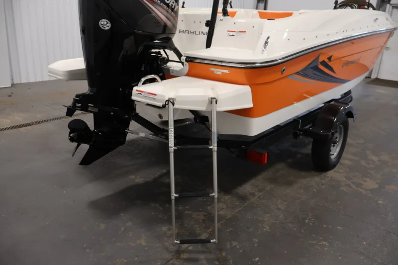 Slide: The Image of 2019 Bayliner Element 180 XL boat with orange hull and outboard motor. - 33