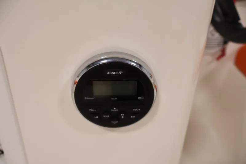 Slide: The Image of Jensen audio system on 2019 Bayliner Element 180 XL boat dashboard. - 22