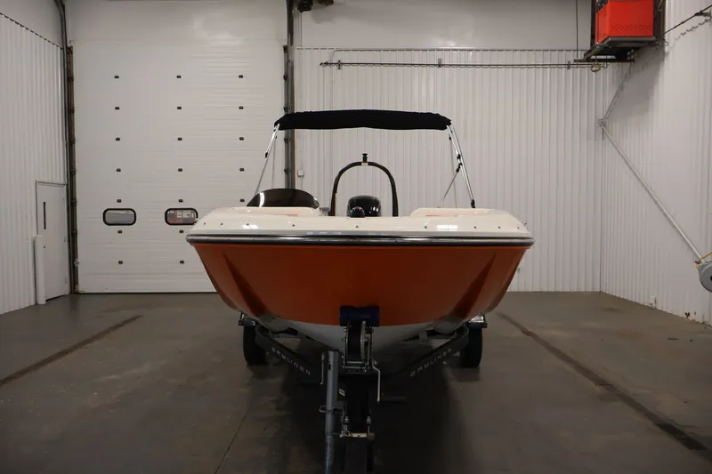 Slide: The Image of 2019 Bayliner Element 180 XL boat in indoor storage, front view. - 2