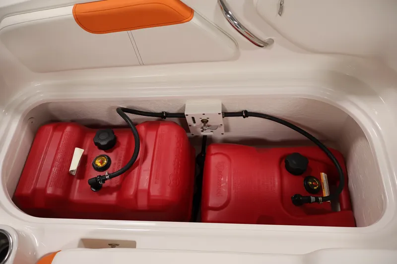 Slide: The Image of 2019 Bayliner Element 180 XL boat fuel tanks in storage compartment. - 31