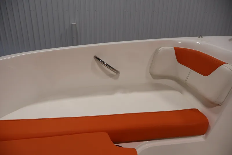 Slide: The Image of 2019 Bayliner Element 180 XL boat interior with orange and white seating. - 14
