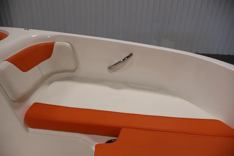 Slide: The Image of 2019 Bayliner Element 180 XL boat interior with orange and white seating. - 12