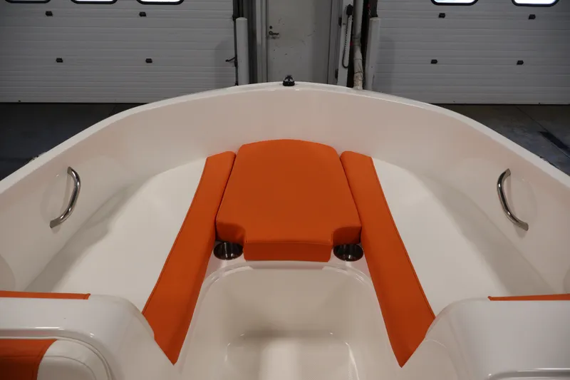 Slide: The Image of 2019 Bayliner Element 180 XL boat interior with orange seating and stainless steel handles. - 9