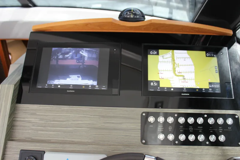 Slide: The Image of Dashboard of 2019 Tiara Yachts C39 Coupe with Garmin navigation displays. - 22