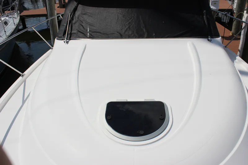 Slide: The Image of 2019 Tiara Yachts C39 Coupe deck with hatch, docked at marina. - 37