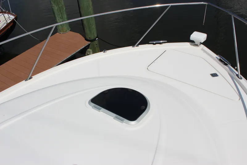 Slide: The Image of Bow deck of 2019 Tiara Yachts C39 Coupe with hatch and railing. - 36
