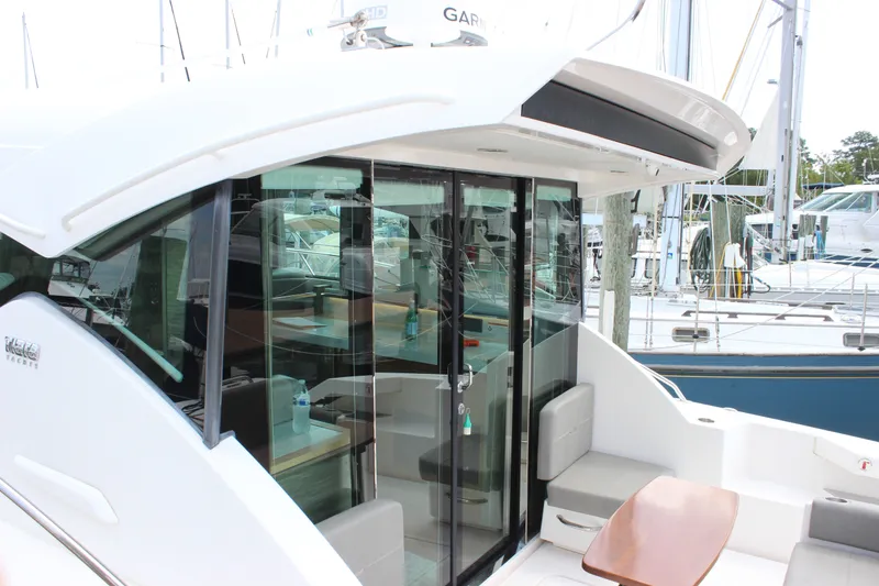 Slide: The Image of 2019 Tiara Yachts C39 Coupe with sleek design and spacious seating area. - 14