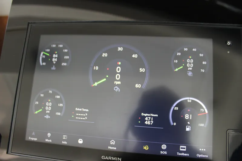 Slide: The Image of Dashboard display of a 2019 Tiara Yachts C39 Coupe showing engine metrics and gauges. - 96