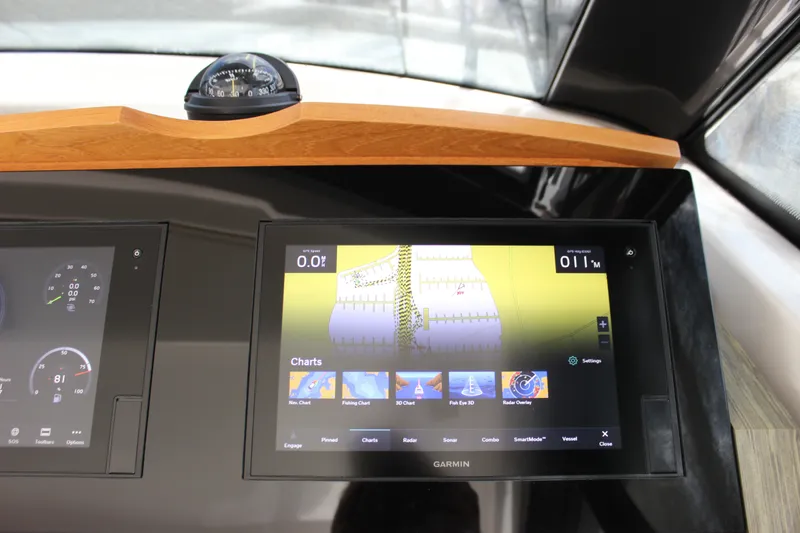 Slide: The Image of Dashboard of a 2019 Tiara Yachts C39 Coupe with Garmin navigation display. - 98