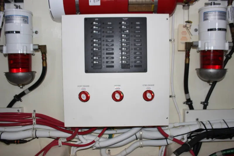 Slide: The Image of Electrical panel in 2019 Tiara Yachts C39 Coupe engine room with wiring and controls. - 45