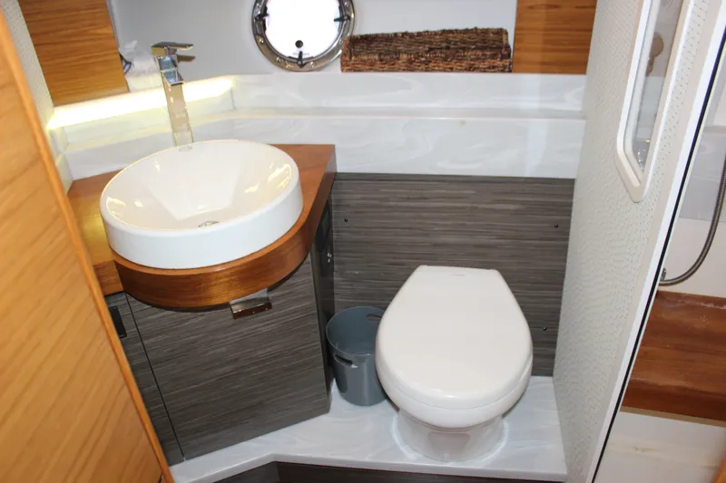 Slide: The Image of Modern bathroom interior of 2019 Tiara Yachts C39 Coupe with sink and toilet. - 83