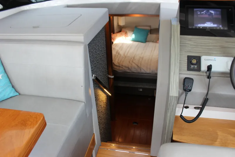 Slide: The Image of 2019 Tiara Yachts C39 Coupe interior with cozy cabin and modern navigation equipment. - 72