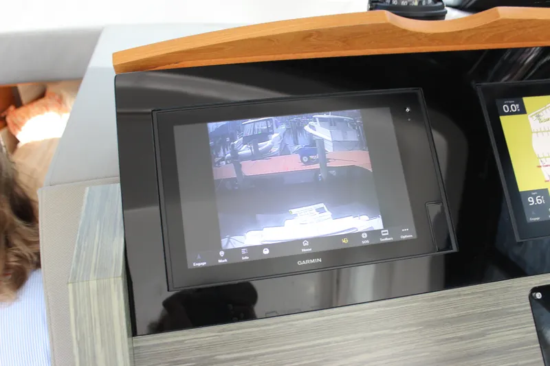 Slide: The Image of Garmin display on 2019 Tiara Yachts C39 Coupe showing navigation and camera feed. - 21