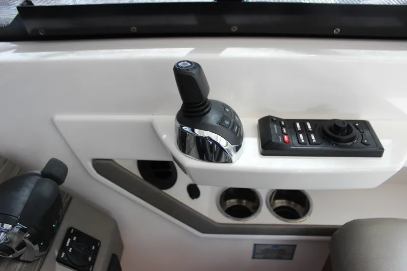 Slide: The Image of Control panel of a 2019 Tiara Yachts C39 Coupe with joystick and buttons. - 101
