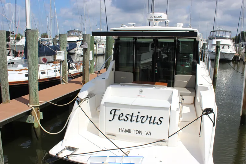 Slide: The Image of 2019 Tiara Yachts C39 Coupe named "Festivus" docked in a marina, Hamilton, VA. - 33