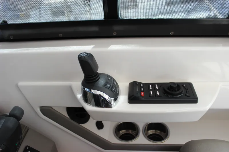 Slide: The Image of Control panel of 2019 Tiara Yachts C39 Coupe with joystick and buttons. - 24