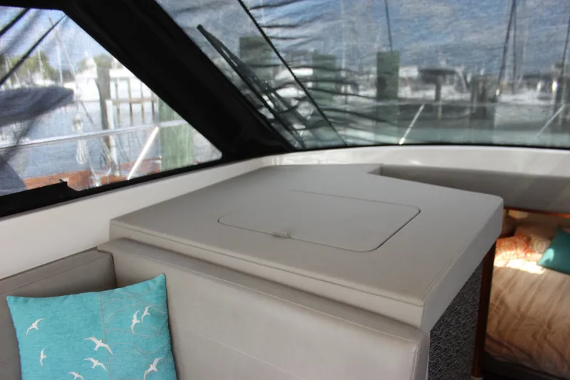 Slide: The Image of Interior of 2019 Tiara Yachts C39 Coupe with seating and decorative pillow. - 73