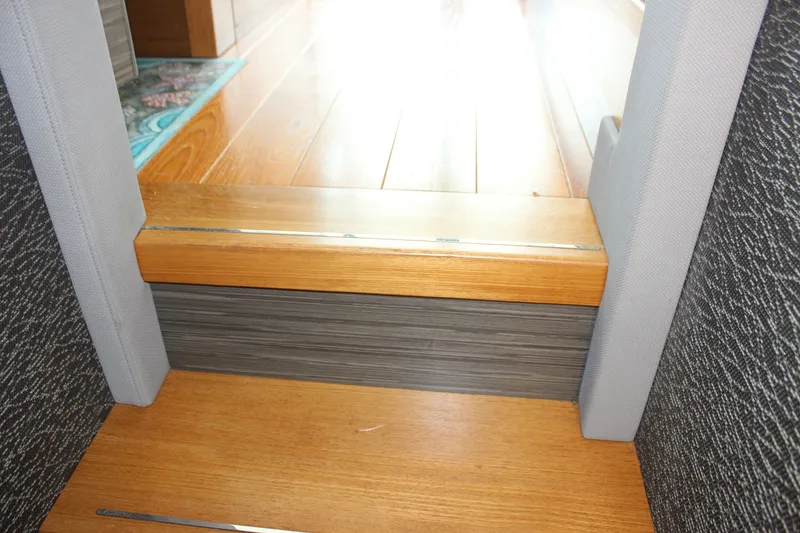 Slide: The Image of Interior wooden steps on a 2019 Tiara Yachts C39 Coupe. - 94