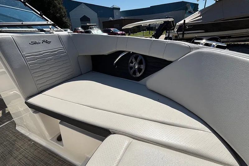 Slide: The Image of 2021 Sea Ray SPX 190 Outboard boat interior with luxurious seating and sleek design. - 20