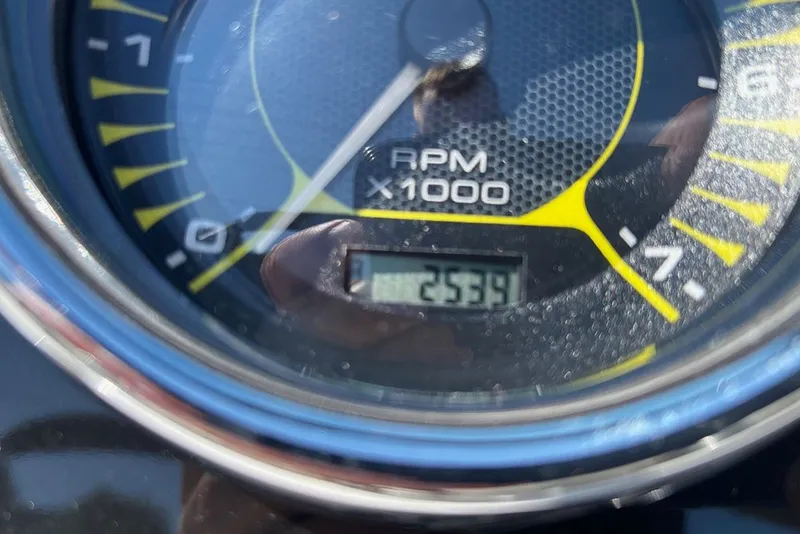 Slide: The Image of Close-up of a 2021 Sea Ray SPX 190 Outboard tachometer displaying 2539 RPM. - 16