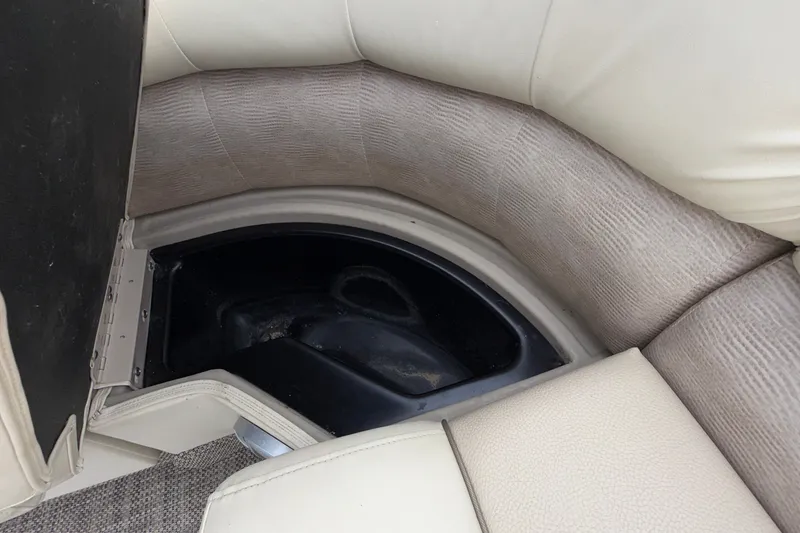 Slide: The Image of Interior storage compartment of a 2015 Bennington 2550 RSR boat. - 34