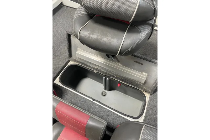 Slide: The Image of 2019 Ranger RT188 boat interior with storage compartment and seating. - 16