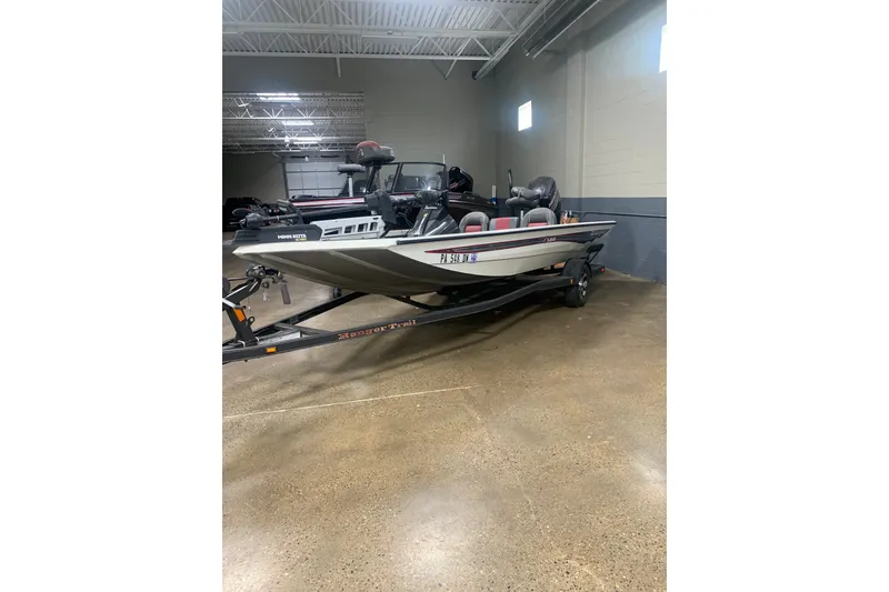 Slide: The Image of 2019 Ranger RT188 fishing boat on trailer in indoor storage facility. - 3