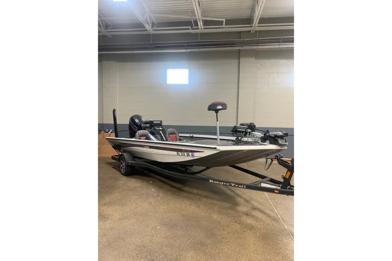 The Image of 2019 Ranger RT188 fishing boat on trailer in indoor setting. - 1