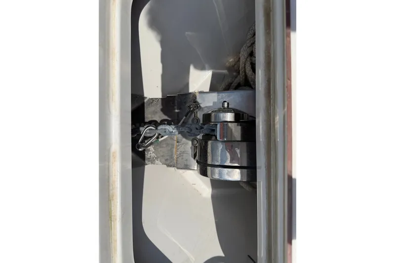 Slide: The Image of 2020 Sea Pro 239 Center Console anchor locker with chain and winch. - 27