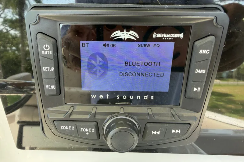 Slide: The Image of 2020 Sea Pro 239 Center Console stereo system showing Bluetooth disconnected. - 22