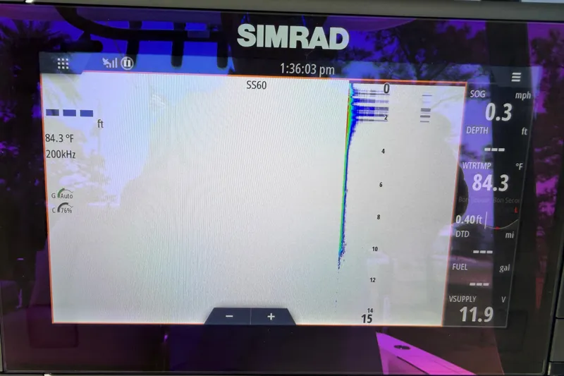 Slide: The Image of Simrad display on 2020 Sea Pro 239 Center Console showing sonar and navigation data. - 23