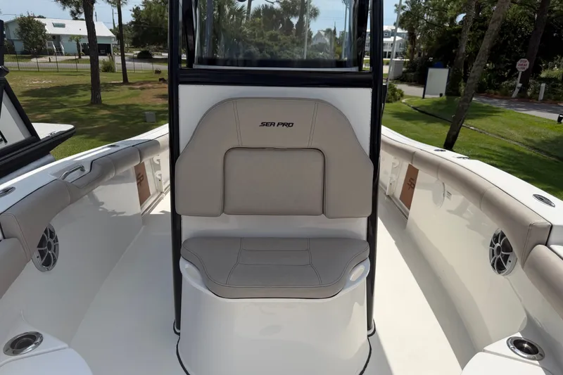 Slide: The Image of 2020 Sea Pro 239 Center Console boat interior with seating and speakers. - 28