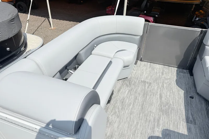 Slide: The Image of 2027 Bentley Pontoons Legacy 223 Swingback interior with gray seating and flooring. - 15