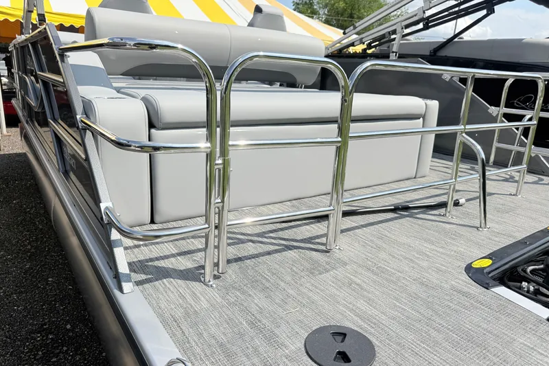 Slide: The Image of 2027 Bentley Pontoons Legacy 223 Swingback with sleek chrome railing and plush seating. - 20