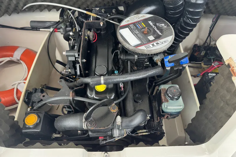 Slide: The Image of Engine compartment of a 2009 Tahoe Q4 SS boat with MerCruiser 3.0L motor. - 22