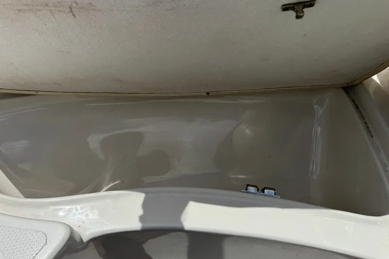 Slide: The Image of Open storage compartment in a 2009 Tahoe Q4 SS boat. - 27