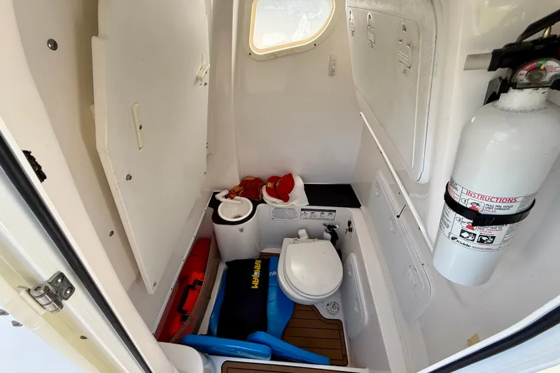 Slide: The Image of Interior of 2017 Sea Fox 288 Commander boat with toilet and safety equipment. - 29