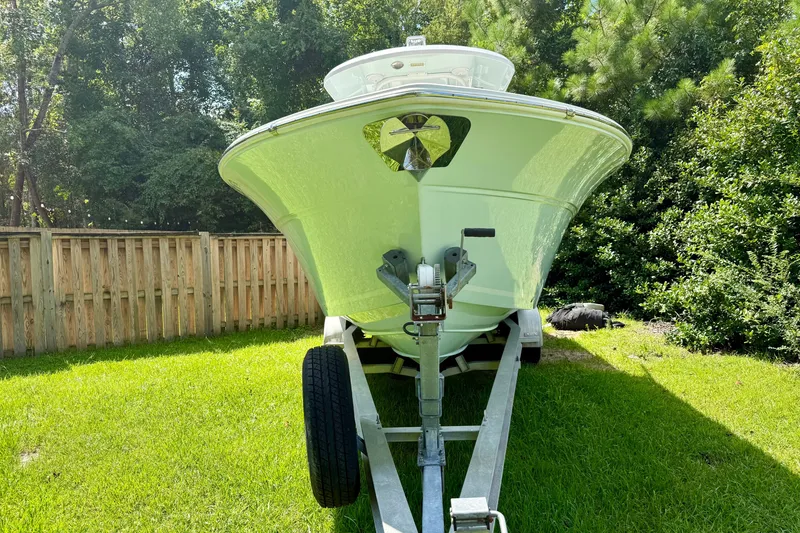 Slide: The Image of 2017 Sea Fox 288 Commander boat on trailer in a grassy yard. - 8