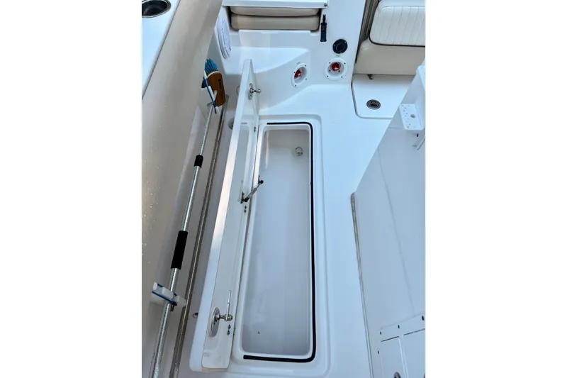 Slide: The Image of 2017 Sea Fox 288 Commander boat interior storage compartment open. - 31