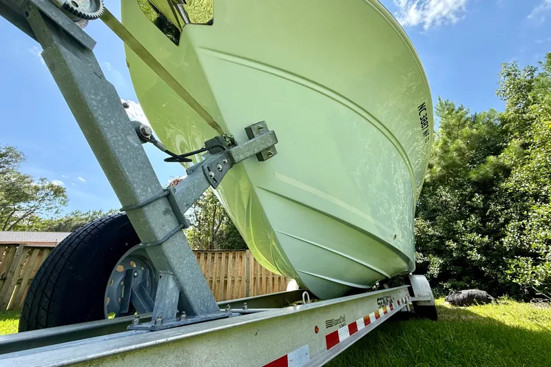 Slide: The Image of 2017 Sea Fox 288 Commander boat on trailer, parked outdoors under blue sky. - 9