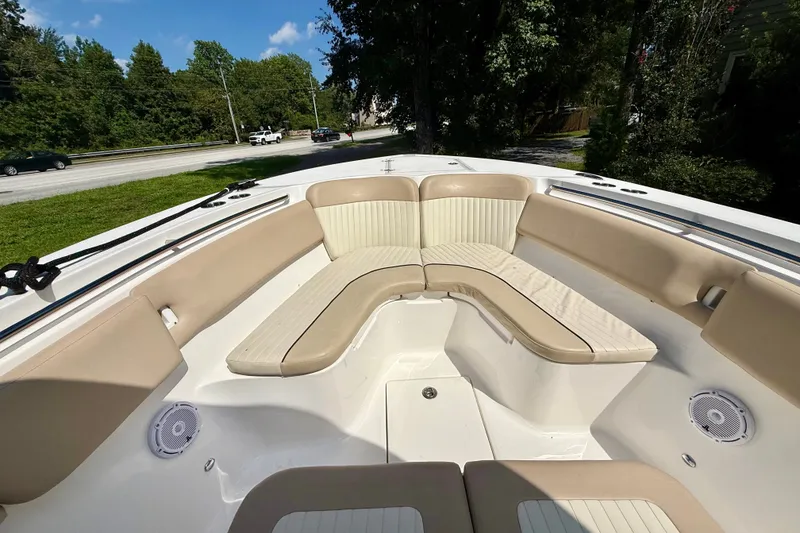 Slide: The Image of 2017 Sea Fox 288 Commander boat interior with beige seating and speakers. - 27