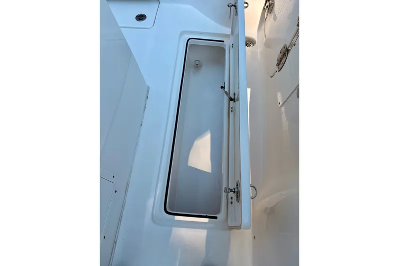 Slide: The Image of Open storage compartment on a 2017 Sea Fox 288 Commander boat. - 30